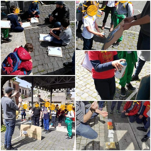 Colonna, Gofy incanta i bambini con la street art e le sue “Serrande d’autore”